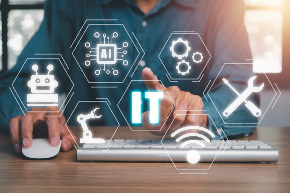Business person hand using computer with VR screen IT automation icon, robotic process automation, marketing dashboard.